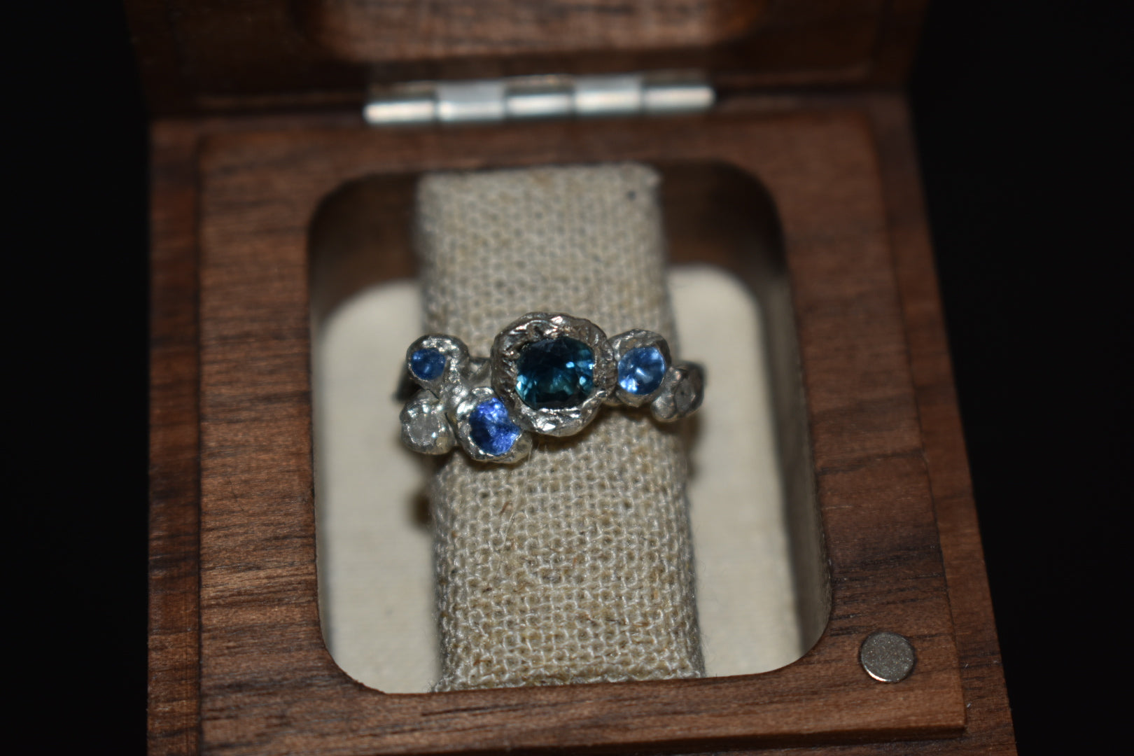 sapphire and salt and pepper ring in box